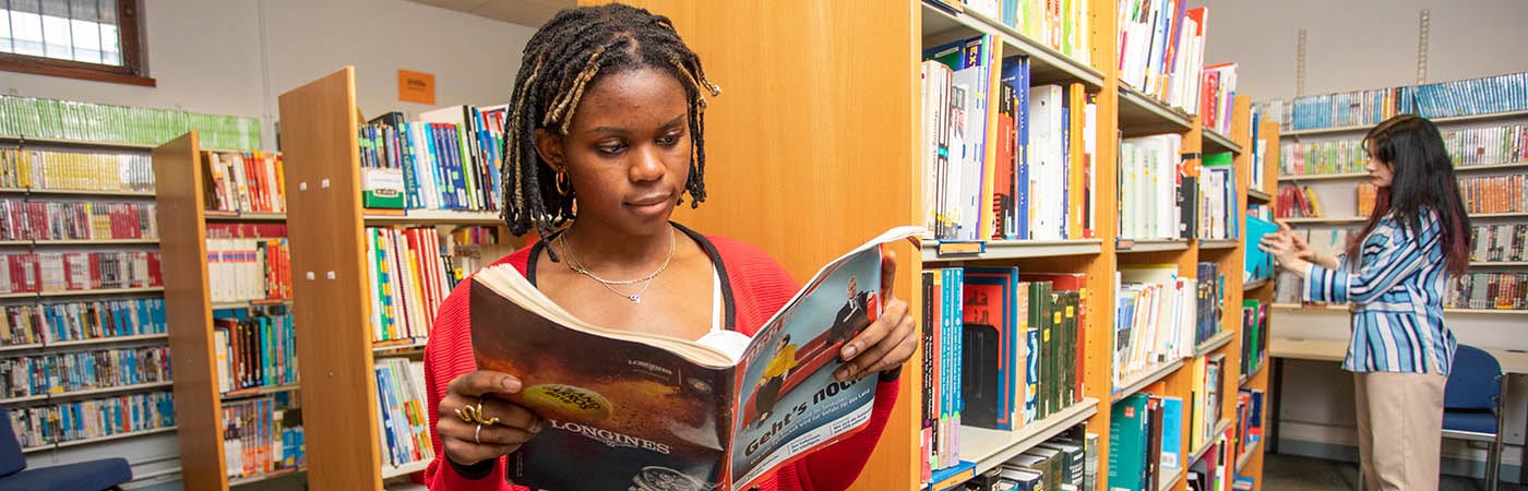 Students browsing in a campus library